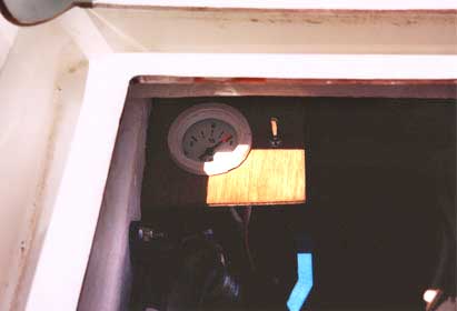 Fuel guage mounted in locker